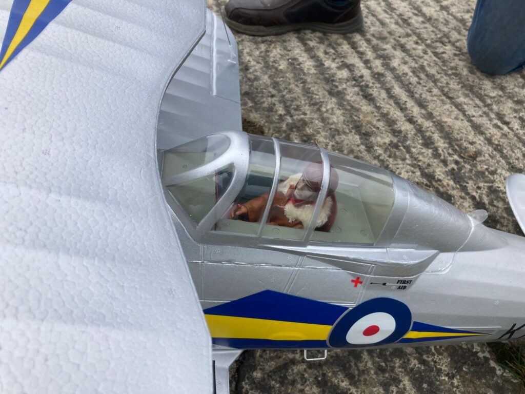 Close ups of the Pilot in the Gladiator remote control model biplane.